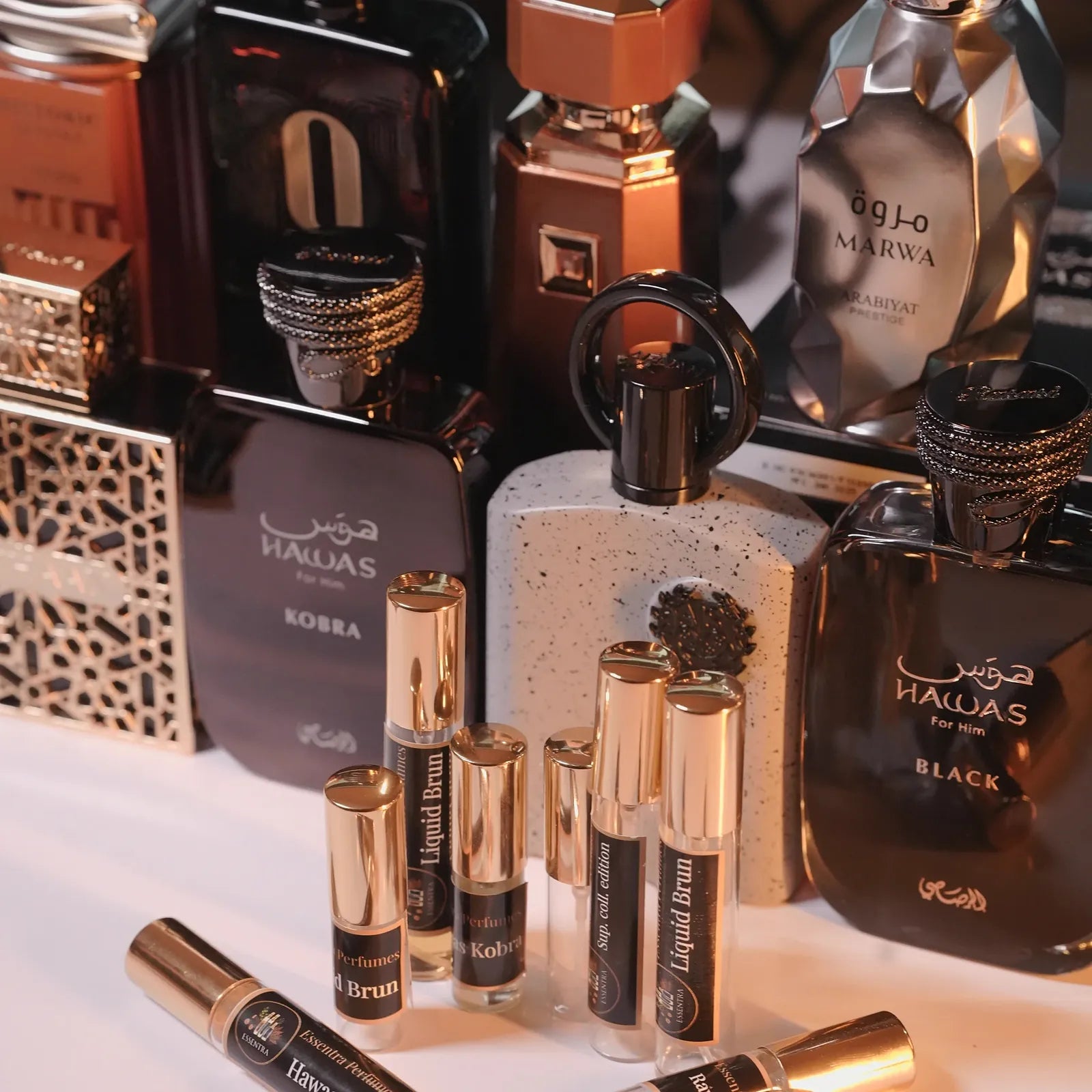 Middle Eastern perfume bottles and metal decant atomizers